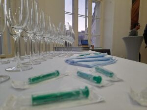 glasses and syringes at the public performance lecture during the environmental disease workshop_©health matters